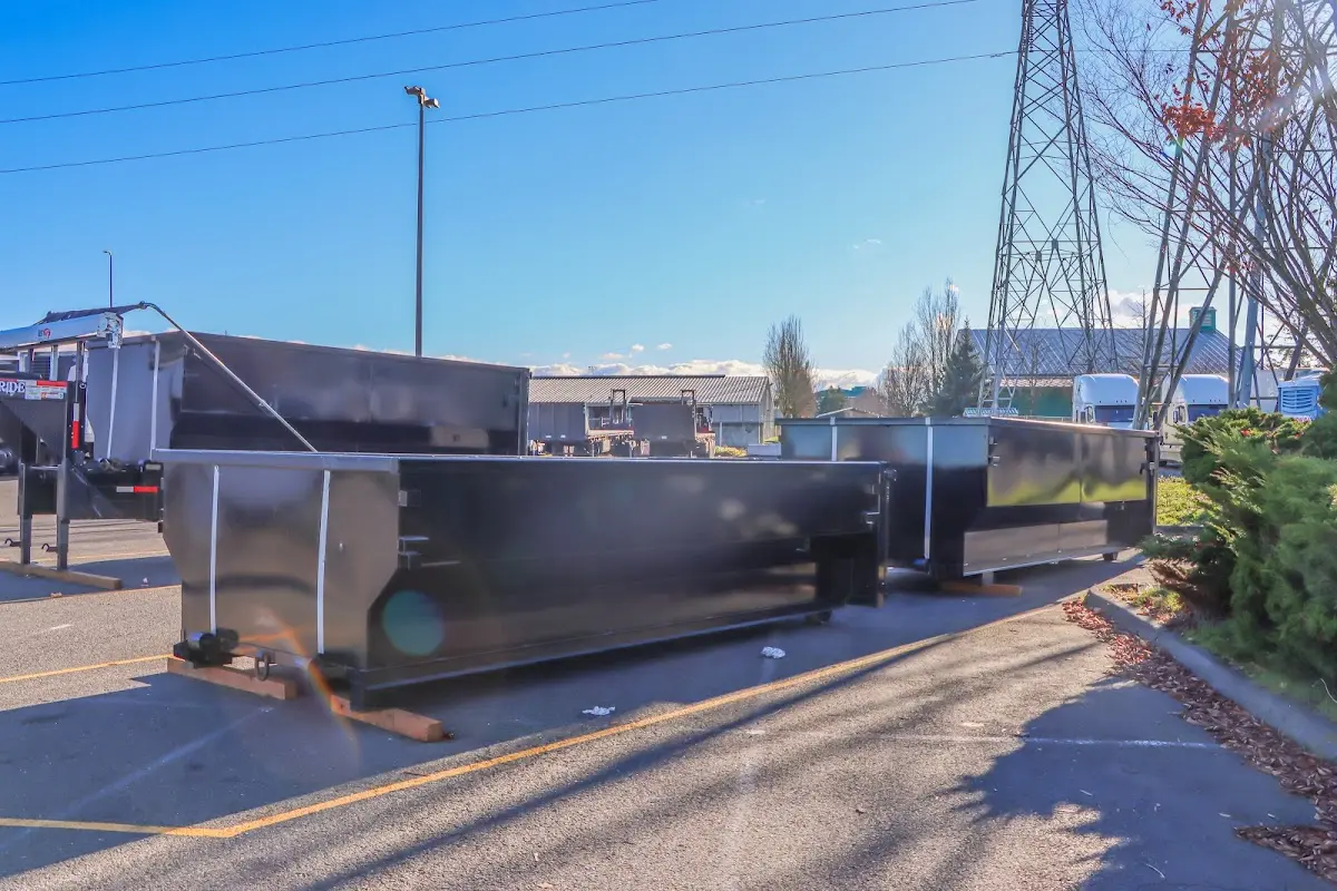 Roll-off dumpster ready for waste disposal at job site for Roofing Dumpster Rental in Marengo